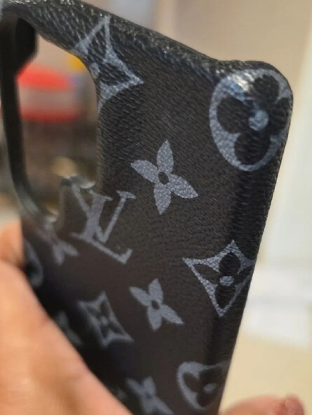 Phone Case In Black And Gray Pattern Fits an S26 Ultra Phone.
